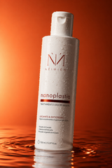Neimien Nanoplastia dettaglio gocce su gradiente terracotta